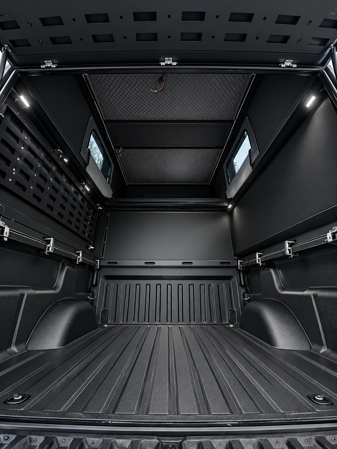 Inside the KOVR canopy: open floor, LED lights and a window on each side