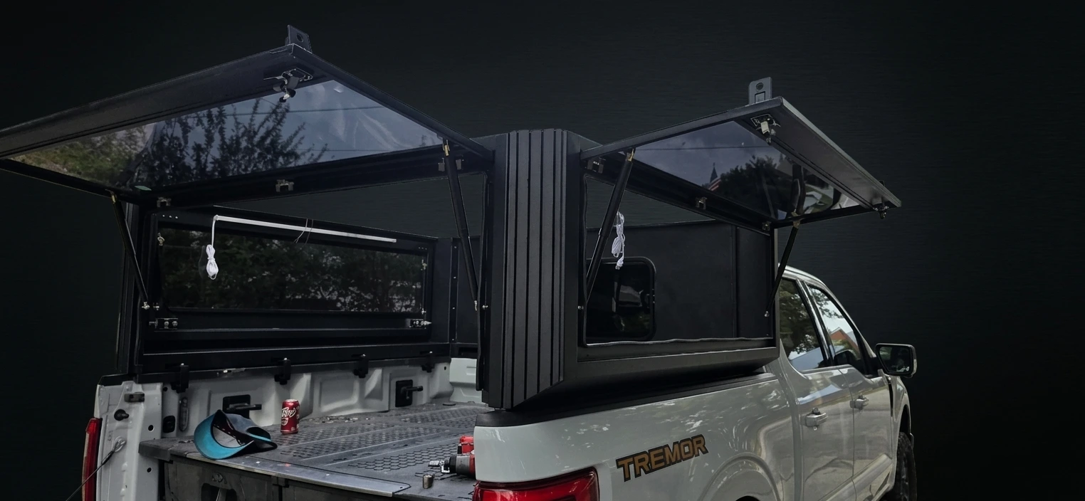 A KOVR installed on a pickup bed, panels open